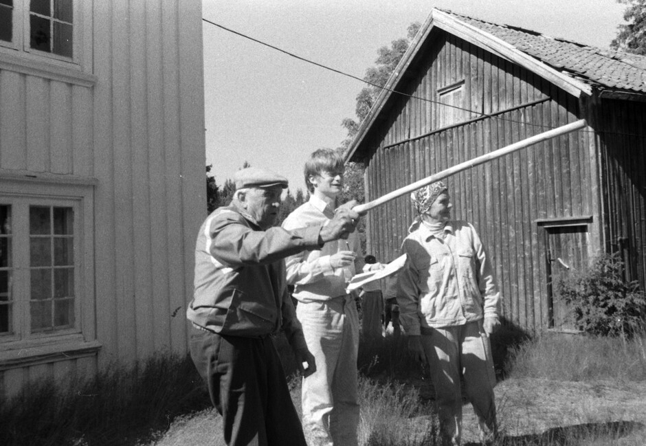Old photo of people at a farm