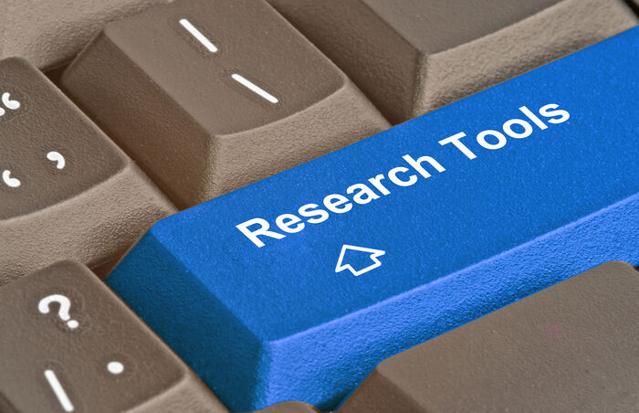 Bilde av en tastaturknapp med tittel "Research tools"